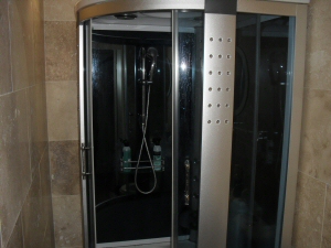 Photo - Aqua Plus steam shower with integrated radio and telephone, fitted as an en-suite for a Blackpool customer