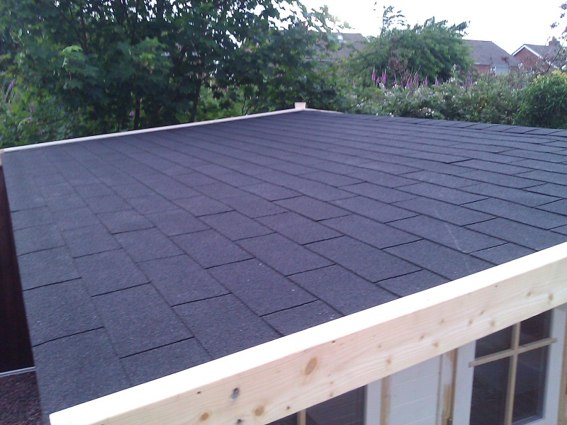 Photo - Outside Office (6 of 7) - Watertight and nearly complete with the roof fitted with three tab felt shingles. - Log Cabins - Home - © J C Joinery